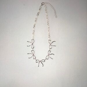 Elegant Silver Bow Necklace